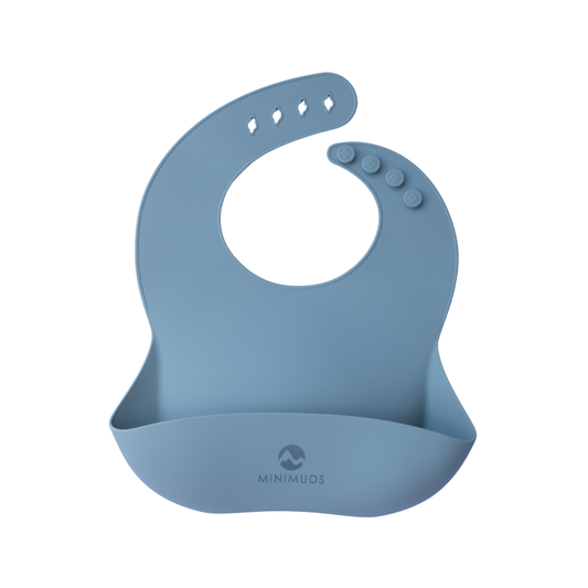 Blue silicone bib with Minimuds logo on a white background