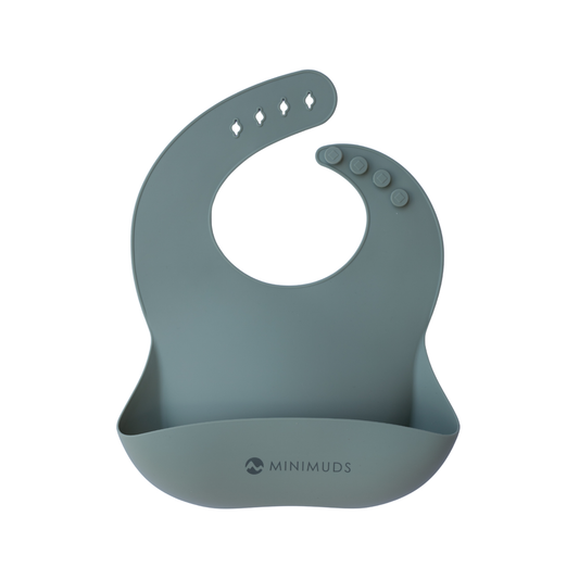Sage green silicone bib with Minimuds logo on a white background