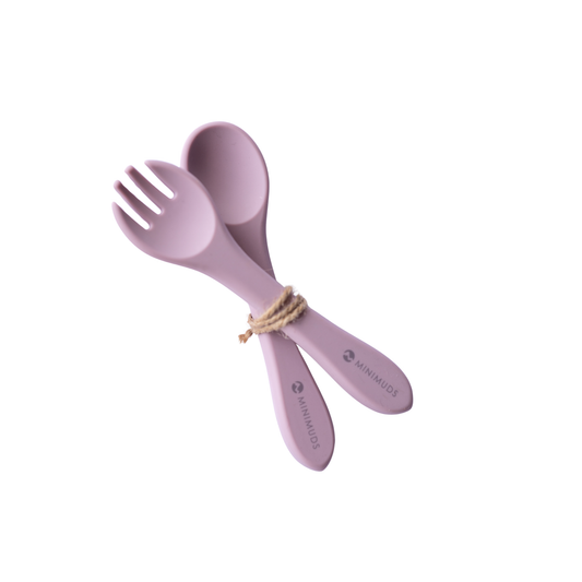 Purple fork and spoon set on a white background